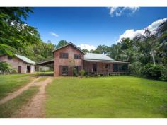  22 Tallowood Road Possum Creek NSW 2479 Offers Over $1,050,000 Character filled Family Home in Possum Creek An opportunity to secure a peaceful lifestyle close to nature in Byron’s best hinterland. Located just 15 minutes from the beaches in Byron Bay and 10 minutes to Bangalow on a leafy country road, this cul-de-sac property in Possum Creek is offered for the first time in 25 years. The 5 acre north-east facing property features a tri-level home with spacious, open plan living areas, cathedral ceiling and expansive open surround verandahs. The residence is set back from the road for complete privacy, making the most of the rainforest views. Enjoy the sounds of the fauna that call the property home, including resident koalas. Four bedrooms with built-in robes are split across 2 levels. Upstairs is an open mezzanine study and the main bathroom. Downstairs there is a second bathroom, living/rumpus room and laundry. A seperate large 2 car garage features spacious mezzanine storage. Across the lawn but hidden from view is a very sweet 1 bedroom self contained guest lodge over 2 levels providing generous guest accommodation. Having poured years of labour and love into this wonderful property the owners are looking to relocate to find their next project. The Tallowood property is looking for an owner ready to put their own touch on the place while enjoying the relaxing lifestyle on offer. Features: - 5 Acres - 4 bedrooms with built in robes and study - Wide shaded verandah wraps around the home for seamless indoor/outdoor living - Rainforest Gardens, Dam and Rural views - New kitchen with granite benchtop - Polished timber floorboards - Combustion Fire Place - Antique windows & doors - Double car garage/Workshop with attic storage - Guest accommodation with seperate driveway access - 5kW photovoltaic Solar panel system - Solar Hot Water - Grey water system - 50,000 litres Concrete Water Tank 