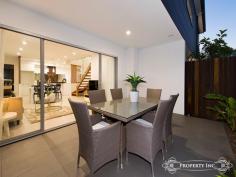  122 Waverley St Annerley QLD 4103 From Offers Over $589,000 An ultramodern design of brand new luxury The cutting edge design of these brand-new townhouses redefines the ultimate in stylish living.  Built to the highest standards, striking contemporary architecture by Cunningham Designs offer quality appointed homes that exude style and comfort throughout and boast sleek modern fixtures and fittings. The use of space and light, together with the use of glass and timber create a breathtaking backdrop to the streamlined open-plan living/dining area.  Beautifully positioned, these stunning residences soak up north south cross ventilation and reveal an ensemble of deluxe timber and stone finishes. Plush cabinetry and glass finishes throughout a relaxed layout feature a gourmet Kitchen that boasts Miele appliances, Caesar stone benches, under mount Olivieri sink, soft close drawers and 2 pac cabinetry. Each townhouse offers large alfresco terraces that, with their landscaped surrounds, offer a true extension to your living space. The generous bedrooms are gently filled with warming light, and the sleek bathrooms with imported Italian tiles add another level of luxury. Remote garage, hardwood timber flooring, ducted air conditioning and video intercom further complement the design, This boutique development of impeccable new residences, finished to perfection with undeniable quality and luxury, await those with high expectations. 