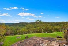  13 Chiltern Rd Ingleside NSW 2101 Nature As Far As The Eye Can See This exceptional 5 and a half acre block in Ingleside overlooks possesses uninterrupted views of Ku-ring-gai National Park and a wealth of opportunity. The tranquillity and retreat like ambience of the property and the lodge like accommodation will have you in disbelief that you are only 30 minutes from Sydney CDB and 5 minutes to a number of local shops, restaurants, cafes, beaches, sporting facilities and retail outlets.  With a 3 bedroom home that already allows for 2 self contained areas you it would be perfect for visitors or families looking for a dual occupancy home. The home has been designed on the North-Eastern side of the property and manages to capture the magnificent views of Ku-ring-gai National Park from every area.  The property itself has an area suitable for an arena, stables, fenced paddocks, garaging for 2 cars and carport for 8 more, established dams and ceremonial area for events such as weddings. There is so much more that the astute buyer could do at Rainbows End with fantastic development potential or Bed & Breakfast style retreat possibilities (STCA).  Take advantage of the unique Northern Beaches opportunity and live a holiday everyday 