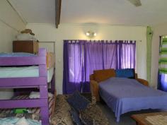  40 Kode Rd Carmoo QLD 4852 Comments * Carmoo is just 10 minutes from Mission Beach! * Cosy liveable shed * Double carport * Fruit trees and a lagoon! If getting into the market at the very bottom is your aim, where privacy and room to move is important, take a look at this one!  Basic liveable shed with services connected and plenty of thriving fruit trees on site! Build a more substantial home when time and the budget allows!  Talk to Tania for all the details and to book your inspection - Exclusively Yours! Features Outdoor entertainment area Courtyard   	 Water access Undercover outdoor area 