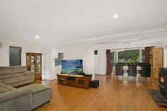  160 Prices Circuit Woronora NSW 2232 $879,000 FAMILY HOME WITH RIVER VISTAS Bed4Bath2Car2 Set in a picturesque setting overlooking the Woronora River, this neat and tidy two storey home offers a great opportunity for a young family. Boasting large outdoor entertaining area's and a substantial approx 740sqm tiered grass yard, the home would be perfect for anyone looking at establishing themselves in the tightly held Woronora market. - Generous proportions and light filled interiors throughout  - Selection of various formal and informal living and entertaining areas - Modern kitchen with stone benchtops & quality stainless steel appliances - 4 bedrooms with ensuite in main, two with built in robes. - Reverse cycle air conditioning on both levels with fireplace in living - Undercover double car port, timber flooring throughout  - Large timber entertaining deck accompanying a generous grassy backyard - Approximately 740 square metre land  - Serene bush setting with elevated water views over the Woronora River 