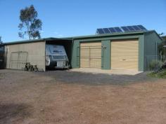  6715 Nerriga Rd Nerriga NSW 2622  $485,000 6715 Nerriga Road 	 This 45 hectare property with a modern 3 bedroom solar powered homestead can be found fronting the new main link road from Canberra to Nowra. Offering a wilderness self-contained lifestyle within reach of 3 rural town centreâ€™s an hour or less away. Enjoy the views of the distant ranges, bush land and pasture from the country verandahs of the home. - Ranch style 3 bedroom homestead - 45 hectares of excellent idyllic bush land - Around 16 hectares of pasture with dam - Self-contained solar system and water storage Property Details Property Type: 	 Rural Bedrooms: 	 3 Bathrooms: 	 2 Garages: 	 2 Land Area: 	 45ha 