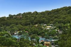  160 Prices Circuit Woronora NSW 2232 $879,000 FAMILY HOME WITH RIVER VISTAS Bed4Bath2Car2 Set in a picturesque setting overlooking the Woronora River, this neat and tidy two storey home offers a great opportunity for a young family. Boasting large outdoor entertaining area's and a substantial approx 740sqm tiered grass yard, the home would be perfect for anyone looking at establishing themselves in the tightly held Woronora market. - Generous proportions and light filled interiors throughout  - Selection of various formal and informal living and entertaining areas - Modern kitchen with stone benchtops & quality stainless steel appliances - 4 bedrooms with ensuite in main, two with built in robes. - Reverse cycle air conditioning on both levels with fireplace in living - Undercover double car port, timber flooring throughout  - Large timber entertaining deck accompanying a generous grassy backyard - Approximately 740 square metre land  - Serene bush setting with elevated water views over the Woronora River 