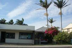  63 Pacific St Corindi Beach NSW 2456 $500,000 Reduced MASSIVE $100,000 PRICE REDUCTION Room to grow! The beach cottage rests on a whopping 1012m2 block and is only 200m (approx) to the breathtaking Corindi Beach. The home consists of 2 bedrooms, sunroom/rumpus room with access to backyard. Neat and tidy kitchen, dining area, separate large lounge room with ocean views. Small shop front is attached. Back deck offers ocean views and overlooks fully fenced massive backyard with loads of potential. Close to post office and general store. This home has a private yard and carport. This property has prior DA approval for a veterinary clinic. Corindi Beach is a growing coastal community and offers a relaxed lifestyle. The township consists of a primary school, local post office, shop, caravan park & skate park. The beach is patrolled in summer with a mix of safe swimming spots, rockpools for the kids to explore & viewing platforms to dream the day away. Located only 25 minutes to Coffs Harbour & 35 minutes to Grafton. Property: 	 House Bedrooms: 	 2 Bathrooms: 	 1 Land Size: 	 1012 Sqm Rooms: 	 Sun Room Council: 	 Coffs Harbour 
