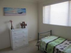  6/103 Boyd St Woorim QLD 4507 $329,000 Only Metres from Woorim's Surf Side Beach A rare opportunity exists to purchase a two bedroom top floor unit within a small complex, with balconies overlooking established gardens and water views. Extra high ceilings and an abundance of natural light create a sense of space throughout. This unit enjoys a well equipped 2pac kitchen, overlooking the open plan living/dining room with views to the North. You will appreciate all that's on offer from the moment you enter this outstanding architecturally designed residential apartment, situated close to all the many facilities here within this popular and sought after location. This is an ideal setting for anyone wishing to take advantage of this unique lifestyle now available for purchase. FEATURES INCLUDE:- * Well equipped full sized kitchen with plenty of storage * Open plan lounge and dining area * 2 good sized bedrooms located away from living area with built-in robes * Two way bathroom with concealed laundry and separate toilet * Secure entry with CCTV & Intercom system * Extra long single garage with remote door and separate storage space * Car washing bay, outside shower, communal BBQ and automatic sprinkler system * Short walk to Golf Club, Surf Club, Hotel, Restaurants, Doctor, Pharmacy, Patrolled beach and IGA supermarket.   Property Snapshot  Property Type: Unit Construction: Rendered Block Features: Balcony Built-In-Robes Close to schools Close to Transport Coastal Storage Waterview 