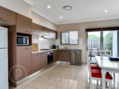  2/44 Vale Street Moorooka Qld 4105 Oversized Townhouse Offering Privacy and Style This one is not to be missed. Positioned within a boutique complex of two and conveniently located just a hop, skip and a jump to the local Woolworths and all other amenities, this oversized townhouse is the new home you've been looking for. Stepping into the home, you will be surprised by the large and well thought out floor plan on offer. Contemporary and light filled interiors boast open plan living, dining, a modern kitchen plus a private, undercover courtyard - a perfect spot to unwind and enjoy time with friends and family. Within the home you'll also find an internal laundry plus powder room, ducted air-conditioning throughout, three generous bedrooms, all with built-in wardrobes while the master bedroom comprises an ensuite and spacious walk-in wardrobe. Notable features include: - Light filled, open plan living and dining with easy-care tiling throughout - Modern kitchen with stainless steel appliances and gas cooking - Private, enclosed courtyard at the back with outdoor ceiling fan - Separate, internal laundry plus powder room - Three generous bedrooms with mirrored built-in robes and ceiling fans - Master bedroom featuring a large walk-in robe and ensuite - Main bathroom with shower-over-bath and plenty of cupboard space - Ducted air-conditioning and ceiling fans throughout - Foxtel cabling and internet points installed - Remote access, lock-up garage with storage space plus space for a second car in the driveway - Elevated position with leafy, urban views Set on a quiet street, you are just moments from local shopping, beautiful parks and bikeways, schools, train and bus transport and just a short drive from the city. With plenty of room to grow, this home is perfectly suited to anyone looking to break in to the property market or for the astute investor, the property is located in a high rental demand area and is currently rented for $480/week. Don't miss out, contact Roger Vogelsang for more information and to arrange your inspection.   Property Details 	 Price  Submit All Offers 