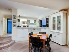  4/22 Macgregor St Wilston QLD 4051 EXTRA LARGE, PRIVATE AND STYLISH TOWNHOME Auction In rooms, Thursday June 4th @ 6:30pm, Place HQ, 33 Lytton Rd, East Brisbane. Conveniently located in prestigious Wilston, and just one of six townhomes in a secure gated enclave, this quality home is generous in size and exhibits subtle architectural flourishes that enhance the spacious layout. Popular Wilston Village, with a choice of cafes and restaurants is within walking distance, as are Home Zone and Reading shopping centres. Situated just 3km from the city it also enjoys close proximity to parklands, bikeways, RBH, the ICB, major arterial roads and the airport tunnel. Bus and train transport is a just a few minutes walk from home.  The sparkling kitchen displays a timeless design and includes a pony wall that allows interaction with family and guests in the step-down, open plan living and dining area. Glistening Caesarstone benchtops, stainless steel appliances and glass splashback ensure optimum functionality as well as style. Two Queen size bedrooms with built-in robes are located on the upper floor including a family bathroom and king-sized master suite featuring ensuite and Walk In Robe with sliding glass doors leading out to a private balcony amid the treetops.  Professionally designed and landscaped, the exquisite private garden and patio is accessed from the living area and provides a tranquil oasis for entertaining, alfresco dining or just a place to exhale and relax at the end of the day.  Additional features comprise a powder room on the lower level, air-conditioning and security screens throughout, abundant storage, a vast remote double garage opening onto the courtyard, visitor parking and electronic gated entry to the pet friendly complex. With a total of 265 square metres of living space, a townhome of this size is rare. Welcome home to your new Place *This property is being sold by auction and therefore a price guide cannot be provided. The website may have filtered the property into a price bracket for website functionality purposes.   Property Details 	 Price  AUCTION IN ROOMS 	 Auction   Thursday, 4 Jun 2015 6:30pm 	 Total Area   265 m2 
