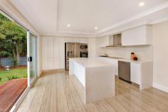  70 Woodbury Rd St Ives NSW 2075 Auction this Saturday, May 9th 12:30pm On Site This newly renovated, single level contemporary home on an impressive 1088sqm level block showcases luxurious open plan interiors & expansive child-friendly gardens.  Conveniently located within walking distance to Brigidine College, St Ives Park Primary, local shops city buses, parks & restaurants, it offers the perfect balance of sophisticated indoor living & relaxed alfresco entertaining. Ideal for growing families looking for space, sleek modern living spaces, & a relaxed lifestyle, this well presented, north facing home is ready to be enjoyed. Chic, modern interiors boasting impressive tiled entry with double doors flowing to light-filled sitting room. Sleek, sundrenched modern kitchen with stone island bench & Miele appliances opens to alfresco, paved courtyard & extensive gardens. Stylish open plan family living/casual dining with beautiful oversized floor tiles; separate formal dining. Four good-sized carpeted bedrooms with built ins, two with well-appointed modern en-suites; contemporary family bathroom. Spacious, open plan study; two-zoned ducted reverse cycle air conditioning in living areas & bedrooms; split system air conditioning in kitchen. Large alfresco courtyard for entertaining; fully enclosed rear gardens with park-like level lawns, perfect for young children & pets. Sophisticated, modern inclusions throughout the home in crisp, neutral tones for the ultimate in contemporary living. Manicured front gardens with level lawns; two car parking; relaxed, single level living in sought after pocket of St Ives close to elite schools, parks & shops. DISCLAIMER: The information contained herein has been provided by our Principal and third parties, which we merely pass on without any representation or warranty given, intended or implied by us as to its correctness and with no liability accepted by us in this regard. You must rely upon your own enquiries as to its accuracy or otherwise 