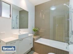  11/85 Queens Road Everton Hills Qld 4053 Offers Over $419,000 This 2013 built and cleverly designed two level townhouse offers the perfect opportunity for young home buyers looking to enter the market, or even the astute investor seeking a low maintenance property in a convenient location. The downstairs area is a fabulous open plan design, with the kitchen featuring Caesarstone bench tops and stainless steel appliances. The separate laundry room is combined with a powder room. Entertaining your family and friends will be a pleasure with the private ?astro turf? courtyard connecting to the spacious open plan living area.  Upstairs are two spacious bedrooms ? the master includes a generous ensuite and walk in robe. These features are sure to please:-  - Two double bedrooms  - Designer bathrooms  - Modern centralized kitchen with Caesarstone bench tops  - Stainless steel appliances  - Integrated dishwasher  - Air conditioned  - Open plan design  - Large porcelain tiles  - Astro grassed courtyard for entertaining  - Timber stairwell with sky light  - 2000 Lt water tank  - Two car accommodation (tandem)  - Extra storage areas Distances:  - Local Shops - 300m  - Gymnasium - 400m  - Local school - 600m  - Brookside shopping centre - 2.5km  - Mitchelton Station - 3.1km  - Chermside shopping centre - 5.4km Everton Hills is a fast growing gem with plenty of sweeping bike ways throughout, parks and surrounded by nature, this place is capturing the hearts of many buyers for this sought after suburb. Being only 10km from the city with local facilities within walking distance it is easy to see why people are falling in love. Families have the ease with local schools nearby like the very popular Price of Peace, McDowall state school and Northside Christian College. Facilities for your local trades, hardware, automotive services and local shops located at Camelia Avenue, Chinook Street and Queens Road will make living easy. Local shopping centres only minutes away Brookside shopping centre, Kmart Arana Hills or short drive to shop till you drop at Chermside. Once discovered locals stay in this gorgeous suburb and if you would like to know further about Everton Hills, I am happy to assist. For Sale - Sale by Negotiation Offers Over $419,000 Features General Features Property Type: Townhouse Bedrooms: 2 Bathrooms: 2 Outdoor Garage Spaces: 2 