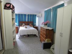  32 Reynolds St Bowen QLD 4805 $370,000 SPACE, LOCATION, SHED House - Property ID: 785093 BEST BIG 4 BEDROOM HOME, BEST masonry block 3 bay shed, BEST yard access from two street frontages, BEST spare room and downstairs living space. This is all on 1,027 sq. metres. We think this one offers more than the average home and must go on your shopping list. UPSTAIRS there are 4 bedrooms plus a sleep-out. DOWNSTAIRS there are another 3 rooms PLUS rumpus PLUS bathroom PLUS storeroom PLUS laundry. Yes, there are many extras in this extraordinary home as you can see. THE BIG FAMILY KITCHEN is friendly and open to the dining room for family conversation and features the biggest walk-in pantry you could wish for. THE LOUNGE is augmented by the large enclosed front verandah providing even more space for the family to spread out - not forgetting the massive rumpus underneath. THE GARDEN is over 1/4 acre and fully fenced and, for pets, the back garden is separated from the front by gates. There is plenty of space for a vege patch. This is a home to see and get the feel for. Arrange to inspect it today - give us a call.  Print Brochure Email Alerts Features  Land Size Approx. - 1027 m2  4 bedrooms  3 spare rooms  Huge 3 bay shed 
