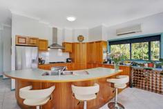  797 Yamba Rd Palmers Island NSW 2463 “Riverview” A Sense of Place, River and Awe Swing off the highway a little north of Grafton, and head towards the coastal village of Yamba. You will find this special home on the river a 10 minute drive from Yamba’s famous beaches. Tucked away off a private laneway, the home has been designed to take full advantage of the river vistas, providing the owners with the ultimate idyllic lifestyle.  The current owners are reluctant to leave the home they have created, which has served them and their family well, improving their lifestyle.  Constructed in 2000, the spacious design incorporates elements such as 11 foot ceilings and covered decks off all the living areas and bedrooms. The open plan living area is north facing, capturing the views from large sliding glass doors beyond the deck and swimming pool, over the immaculately groomed gardens to the river. A major contribution to the lifestyle factor of this home is the impressive kitchen. With solid central island workstation, large wine rack, airconditioning, gas stove, electric oven, dishwasher, double sink and range hood, all stainless steel, oak cabinetry, and practical saucepan drawers. This area extends to the dining room, which overlooks the pool and river. The addition of the leadlight ceiling feature, is reflective of the mood of the river surrounding this property.  The living areas in this home flow seamlessly out onto the covered front deck, the perfect spot to relax with friends and family on hot summer afternoons, and enjoy a BBQ or a pool party while taking in the calming views of the mighty Clarence River.  The master bedroom provides spacious walk in robe, and large ensuite bathroom with corner spa, vanity shower and loo. Two of the remaining three bedrooms, have built-in robes, and the largest fourth room would serve as a bedroom or recreational room for the family. The home is complete with double lock up remote control garage. Not only does this property provide a stylish home with all the modern comforts, there is an established clothing and embroidery business in the 9 x 6m airconditioned shed, serviced by its own shower, loo and office. An opportunity exists for the astute purchaser to utilise this approved facility to have the convenience of working from home. All equipment for the existing business is available for negotiation and the opportunity exists to build on this existing business. The current owners have stated that due to ill health they have not been able to take this business to its full potential.  There is so much more to this property, it simply must be inspected to be appreciated. A unique opportunity to purchase a beautiful home on the Clarence River, an income, an entire lifestyle all in one, this property has it all.  Contact the exclusive marketing agents, Yamba Iluka Real Estate on 6646 2400 to arrange your private viewing today. Property: 	 House Bedrooms: 	 4 Bathrooms: 	 3 Parking: 	 2 Land Size: 	 20680 Sqm Pool: 	 Yes Council: 	 Clarence Valley 