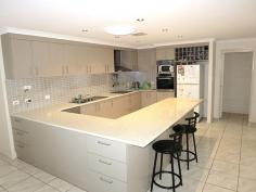  28 Broadhurst Dr Gracemere QLD 4702 $445,000 A Touch of Class with City Views A home built for a purpose - to be 'the home' for a family who appreciates extra room for entertaining and to enjoy a quality lifestyle together....the way a family is meant to be.  - Spacious open plan living which incorporates 3 functional areas  - A well designed kitchen with loads of storage & prep areas  - Massive 'Home Stead Style' walkin pantry  - Generous sized Master bedroom with large walkthrough robe  - Tiled entertainment area with City & parkland views  - Inbuilt 'integrated vacuum system'  - Carpet free flooring  - Large double door entrance with 'stone feature' wall  With so much more to offer....your family will feel right at home.  Please contact me today to arrange your inspection or visit our office at 'Gracemere Central'. For Sale: $445,000 Residential House Garages: 2 Land Size: 703 Sqm Inspections: By appointment Features: Air Conditioning Built In Robes Ceiling fans Close to Schools Close to Transport Convenient location Dishwasher Ensuite Entertaining area Material: Brick, Colorbond Roof Pantry walk-in Vacuum System View: City, Parkland, Mountain Ranges Walk-in Wardrobe Water Tank gourmet kitchen 