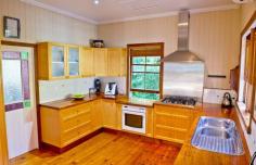  138 Brighton Terrace Sandgate QLD 4017 $770,000 Stunning Queenslander, Must Be Seen! Come along and have a look at this fabulous home - this stunning Queenslander is waiting for your inspection!  The large kitchen and dining areas open on to beautiful side and back decks - the side deck is sheltered with shade sails, perfectly catching the morning sun, while the back deck is a huge 40m2 of covered floor space, perfect for parties and barbeques.  The lounge room opens on to the front veranda with views to the bay and beautiful bay breezes.  The master bedroom, with stunning stained glass bay window, opens onto the front deck with views out to the bay on one side and large sunroom on the other - this would make a great nursery space.  Two bathrooms upstairs, the main with a claw foot bath and separate shower. Downstairs you have the third bathroom and laundry along with two large rumpus rooms - one set up with a stove and kitchen sink, which would make this an ideal retreat for the kids, parents, or extended family. There is ample room undercover for four cars and the boat or van, leaving lots of room for the kids to play in the garden in this fully fenced and secure home.  All this situated just metres to the bayside, with long coastal walkways/bikeways boasting cafes and restaurants just a short walk to the village of Sandgate which would have to one of the best communities in Brisbane!  Great schools and communities services, just 30 minutes by train to the city, close to Brisbane Airport and easy access to both the Gold and Sunshine coasts. This beautiful home will not last long - call Allan Brookes today to arrange your viewing!   Property Snapshot  Property Type: House Construction: Timber Land Area: 655 m2 Features: Air-conditioning Balcony Built-In Wardrobes Ceiling Fans Close to Schools Close to Shops Close to Transport Dishwasher Elevated Block Fully Fenced Yard Garden Shed Gas High Ceilings Internal Access via Garage Internal Laundry Internal Stairs Landscaped Gardens Lock-Up Garage Low Maintenance Block Outdoor Living Rumpus Room Security Screens Shading or Sun Control Stainless Steel Appliances Storage Study Sunroom Tiles Timber Floorboards Undercover Entertainment Area Verandah 