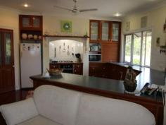  2 Davidson St River Heads QLD 4655 $499,000 Huge Family Castle With Absolute Water Views Tucked away at the end of the street is this sensational property in River Heads, only 500m from the Fraser Island barge. The home has 4 bedrooms with built in wardrobes plus 2 bathrooms with the main bathroom featuring a claw-foot bath which is perfectly suited to the style of the property. Other features include beautiful water views, a large cedar kitchen, Tasmanian blackwood timber floors, air conditioning and ceiling fans, open plan lounge, dining and kitchen, plus a south facing deck with built in barbecue. Two of the bedrooms and one bathroom are downstairs, along with a living area with a bar for entertaining. There is a single lock up garage plus a 6x4m shed and plenty of space on the 1003m2 block, with local shops close by and only 20 minutes drive into town. This home is sure to impress - simply move in and enjoy the relaxed lifestyle that River Heads has to offer.   Property Snapshot  Property Type: House Features: Waterview 