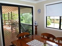  28 Beelong St Macleay Island QLD 4184 $339,000 Water Views, 3 Bedrooms, Beautiful Beelong Street! This quality high-set is a much-loved family home with lovely water views across to Stradbroke Island. Positioned on a big 1,050 m2 block in sought-after Beelong Street, this property is very handy to water access and is loaded with features including: * Spacious open plan living and dining flows to covered outdoor living area * 3 built-in bedrooms, main with walk-in robe and sliding door to front deck * Roomy kitchen with breakfast bar, electric cooking and pantry * Relaxing covered front veranda with good water views to Straddie * Family bathroom features bathtub and separate shower, plus separate toilet * Fully concreted underneath with good height and plenty of potential * Large laundry/store room and an extra toilet downstairs * Big concreted and decked outdoor living areas downstairs * Single garage plus multi vehicle parking potential underneath * Generous 1,050 m2 block, nicely landscaped like the Botanic Gardens * Excellent position on waterfront street near north-eastern tip of Macleay  This quality family home is beautifully presented and features extras like ceiling fans throughout, polished timber floors, security screens, the list goes on. Downstairs has excellent height and is fully concreted, with obvious development potential as a toilet and laundry are already in place. There is plenty of room for a workshop area, boat and trailer, etc., and it would be relatively simple to create self-contained living downstairs for guests or extended family. The back yard is a gardener's delight, with a profusion of plants and shrubs giving a great tropical atmosphere. Beelong Street is a beautiful part of the island, catching the prevailing breezes and with picture postcard views to Stradbroke Island. The sheltered swimming area at Pat's Park is nearby, and excellent boat ramp facilities at Dalpura Beach are also just a couple of minutes away. Access to the waterfront via a block of Council land is less than a minute's walk down Beelong Street. This would be an idyllic place to enjoy our unique island lifestyle, and Macleay Island has so much to offer, with a friendly country town atmosphere, fast reliable ferries and with shops, parks, clubs and essential facilities here on the island and ready for you to enjoy. For more information or to arrange your inspection and free pick-up from the jetty, please contact the listing agent.   Property Snapshot  Property Type: Water Views (some) Construction: Hardiplank Land Area: 1,050 m2 Features: Built-In-Robes Decking Dining Room Fully Fenced Yard Landscaped Gardens Lounge Outdoor Living Polished Timber Floors Security Screens Undercover Entertainment Area Verandah Walk-In-Robes Waterview 