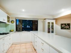 4/22 Macgregor St Wilston QLD 4051 EXTRA LARGE, PRIVATE AND STYLISH TOWNHOME Auction In rooms, Thursday June 4th @ 6:30pm, Place HQ, 33 Lytton Rd, East Brisbane. Conveniently located in prestigious Wilston, and just one of six townhomes in a secure gated enclave, this quality home is generous in size and exhibits subtle architectural flourishes that enhance the spacious layout. Popular Wilston Village, with a choice of cafes and restaurants is within walking distance, as are Home Zone and Reading shopping centres. Situated just 3km from the city it also enjoys close proximity to parklands, bikeways, RBH, the ICB, major arterial roads and the airport tunnel. Bus and train transport is a just a few minutes walk from home.  The sparkling kitchen displays a timeless design and includes a pony wall that allows interaction with family and guests in the step-down, open plan living and dining area. Glistening Caesarstone benchtops, stainless steel appliances and glass splashback ensure optimum functionality as well as style. Two Queen size bedrooms with built-in robes are located on the upper floor including a family bathroom and king-sized master suite featuring ensuite and Walk In Robe with sliding glass doors leading out to a private balcony amid the treetops.  Professionally designed and landscaped, the exquisite private garden and patio is accessed from the living area and provides a tranquil oasis for entertaining, alfresco dining or just a place to exhale and relax at the end of the day.  Additional features comprise a powder room on the lower level, air-conditioning and security screens throughout, abundant storage, a vast remote double garage opening onto the courtyard, visitor parking and electronic gated entry to the pet friendly complex. With a total of 265 square metres of living space, a townhome of this size is rare. Welcome home to your new Place *This property is being sold by auction and therefore a price guide cannot be provided. The website may have filtered the property into a price bracket for website functionality purposes.   Property Details 	 Price  AUCTION IN ROOMS 	 Auction   Thursday, 4 Jun 2015 6:30pm 	 Total Area   265 m2 