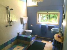  298 Huonbrook Rd Huonbrook NSW 2482 $419,000 Surrounded by lush rainforest and organic fruit trees, this house built with such care and pride has come on to the market for the first time. Part of a Council Approved M.O, this easily accessible 7.5 acres is part of a larger 98 acres with 8 other land parcels.  Features include:  2 Bedrooms  2 Bathrooms  Artists studio  Covered verandas  Above ground pool  Lush gardens For inspections, please call Dave Bosselmann on 0431 100 097 or Russell Siwicki on 0419 627 109. Features General Features Property Type: House Bedrooms: 2 Bathrooms: 2 Land Size: 3.04ha (7.50 acres) (approx) Indoor Toilets: 2 Study Floorboards Broadband Internet Available Open Fireplace Outdoor Balcony Deck Outdoor Entertaining Area Eco-friendly Solar Panels Solar Hot Water Water Tank 