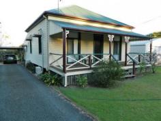  54 Railway St Helidon QLD 4344 $224,500 WALK TO THE SHOPS AND SCHOOL Great location is just one of the features of this 3 bedroom family home on a large fully-fenced block in peaceful Helidon. Enjoy the benefits of solar power, solar hot water, tank and town water and reverse cycle A/C.  Call for an inspection TODAY, this value can't last. FEATURES Bedrooms 3 Bathroom 1 Storage 6x3 Garden Shed (approx) Size 1176m2 (approx) Location Walking distance to school, shops and bus Cooling/heating 2 x Reverse Cycle A/C Parking Carport Other Solar Panels Solar hot water 2 x tanks Fully fenced Contact Scott Collier on 0423 539 872   Property Snapshot  Property Type: House Construction: Cladding Zoning: RESIDENTIAL - LOW DENSITY Land Area: 1,176 m2 Features: Dining Room Fenced Back Yard Fully Fenced Yard Garden Shed Undercover Entertainment Area Verandah 