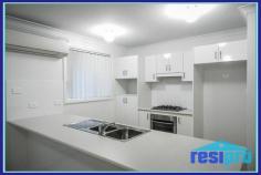  12 Violet Road, Hamlyn Terrace, NSW 2259 Offers from $449,950 This contemporary Resipro Built home comprises 4 bedrooms, master bedroom with ensuite, main bathroom with separate shower & bath. Formal lounge & dining at the front of the house, functional kitchen with gas cook top, dishwasher, good cupboard space, as well as family room with reverse cycle air conditioning. Tiled laundry with external access, linen closet, DLUG with remote, alfresco area and good sized fenced rear yard. Located in Hamlyn Terrace with a current rental return of $440, this property is a must to inspect. 