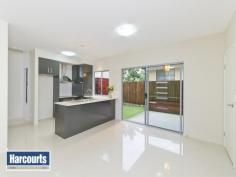 11/85 Queens Road Everton Hills Qld 4053 Offers Over $419,000 This 2013 built and cleverly designed two level townhouse offers the perfect opportunity for young home buyers looking to enter the market, or even the astute investor seeking a low maintenance property in a convenient location. The downstairs area is a fabulous open plan design, with the kitchen featuring Caesarstone bench tops and stainless steel appliances. The separate laundry room is combined with a powder room. Entertaining your family and friends will be a pleasure with the private ?astro turf? courtyard connecting to the spacious open plan living area.  Upstairs are two spacious bedrooms ? the master includes a generous ensuite and walk in robe. These features are sure to please:-  - Two double bedrooms  - Designer bathrooms  - Modern centralized kitchen with Caesarstone bench tops  - Stainless steel appliances  - Integrated dishwasher  - Air conditioned  - Open plan design  - Large porcelain tiles  - Astro grassed courtyard for entertaining  - Timber stairwell with sky light  - 2000 Lt water tank  - Two car accommodation (tandem)  - Extra storage areas Distances:  - Local Shops - 300m  - Gymnasium - 400m  - Local school - 600m  - Brookside shopping centre - 2.5km  - Mitchelton Station - 3.1km  - Chermside shopping centre - 5.4km Everton Hills is a fast growing gem with plenty of sweeping bike ways throughout, parks and surrounded by nature, this place is capturing the hearts of many buyers for this sought after suburb. Being only 10km from the city with local facilities within walking distance it is easy to see why people are falling in love. Families have the ease with local schools nearby like the very popular Price of Peace, McDowall state school and Northside Christian College. Facilities for your local trades, hardware, automotive services and local shops located at Camelia Avenue, Chinook Street and Queens Road will make living easy. Local shopping centres only minutes away Brookside shopping centre, Kmart Arana Hills or short drive to shop till you drop at Chermside. Once discovered locals stay in this gorgeous suburb and if you would like to know further about Everton Hills, I am happy to assist. For Sale - Sale by Negotiation Offers Over $419,000 Features General Features Property Type: Townhouse Bedrooms: 2 Bathrooms: 2 Outdoor Garage Spaces: 2 