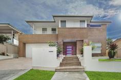  2 O'Connors Rd Beacon Hill NSW 2100 $1,800,000 EXECUTIVE HOME WITH OCEAN VIEWS 5 beds | 3 baths | 2 cars For Sale Price: O/O $1,800,000 Positioned in a popular locale with fantastic ocean and district views, generous proportions, a fabulous dual level layout and light filled interiors all combine to create a first class residence.  Large split level living spaces with the emphasis on open plan Gourmet Kitchen with 20mm stone bench tops and stainless steel Smeg appliances  Four Large bedrooms, all with robes, master with ensuite, walk in robe and Juliet balcony Three bathrooms plus extra toilet/powder room One bedroom self contained guest accommodation Under cover alfresco entertaining area and solar heated splash pool  Double lock up garage, professionally landscaped grounds  Beautifully presented with quality fixtures and fittings through out. Property Overview Property ID: 1P0872 Property Type:House Land Size:463 m² (approx) Garage:2 Construction:B/V Aspect:East Outgoings:Water Rates: $176.56 Quarterly Council Rates: $1688.99 Yearly Features Air Conditioning Built-In Wardrobes Close to Transport Close to Shops Alarm System Pool Close to Schools Ensuite City Views Ocean Views 