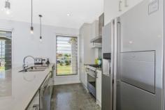  350 Casuarina Way Casuarina NSW 2487 $595,000 Description One of the best priced new homes on the Tweed Coast, located within walking distance to the ocean or Cudgen Creek, comprising an open plan single level design opening out to the north east. Designed to incorporate passive heating and cooling principals, taking the gentle sea breezes and sun light into account. The home features polished concrete floors, solar heating and the outside space to incorporate a perfectly oriented pool or extend the outdoor living space to your own design. Offering 3 bedrooms, 2 bathrooms, 2 car garage with rear access for boat or trailer, European appliances and high end finishes. This home offers a good opportunity for a first home buyer, investor or somebody looking to down size to acquire a very well priced home. Opportunity is knocking – Vendor looking for offers!!! • 	 Single level 3 bedroom, 2 bathroom, 2 car garage (with drive through access). • 	 Polished concrete to the lounge, kitchen, & dining area • 	 North facing indoor & outdoor areas • 	 Cross flow ventilation to all rooms • 	 Carpet to bedrooms  • 	 5,000 litre rain water tank • 	 340 Ltr Rheem Lo Line Solar – Electric boost hot water  • 	 Energy efficient lighting & fans in all bedroom & living rooms 