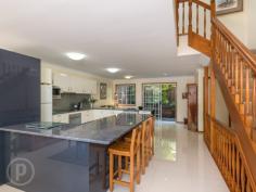  3/20 Glassey Street Red Hill Qld 4059 MORE THAN MEETS THE EYE This spacious three bedroom townhouse is located in a boutique brick complex close to Paddington's Cafe precinct, restaurants, shops, public transport and CBD.  Enter via the front door or the single lock up garage. Stairs lead you to the hub of the home where you will be pleasantly surprised by the openness and size of the living/kitchen/dining area.  The newly renovated kitchen boasts expansive benches, stainless steel appliances, double sink, ample drawers & cupboards, a large pantry and European style laundry. Positioned between the lounge and dining room, it is the perfect place to cook up a storm without leaving your guest unattended.  At one end of the home, large sliding doors open onto the paved rear courtyard and at the other end onto a private balcony with a beautiful green leafy outlook.  A powder room completes this level.  Three double bedrooms are conveniently located on the top level away from the living and entertaining areas. The master opens onto a balcony with views as far as the eye can see and incorporates an ensuite and walk-in robe. Both secondary bedrooms share a central bathroom and enjoy the convenience of built-in robes.  The entry level also incorporates a large home office/second living area. A resort style swimming pool is located at the rear of the complex. Surrounded by tropical plants and palms for privacy, it is the ideal place to sit back and enjoy a sunny afternoon.  Positioned in wide quiet street, less than 4 km from Brisbane's CBD and walking distance to Paddington's Cafe precinct, bars, shops, transport and sought after schools, the location is faultless.  Homes in this location are in high-demand, a quick inspection is a must! Features - Close to CBD, shops & transport - Quiet location with green leafy outlook - Boutique solid complex - Lock up garage - Spacious open plan living - Newly renovated kitchen - Ample storage space/cupboards - Private courtyard - Low maintenance living - Resort style swimming pool - Visitors parking - Pets welcome   Property Details 	 Price  FOR SALE 	 Rates  $310.17 per quarter Total Area   109 m2 