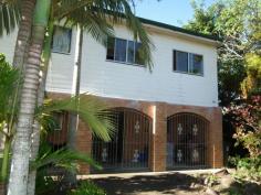  293 Albert St Maryborough QLD 4650 $269,000 5 Bedrooms 2 Kitchens and Loads of Room If your looking for a duelled residence that's close to town then you will find this home worth inspecting.  Downstairs, which is constructed from bricks, opens from a veranda with gated access and presents a large carpeted lounge, practical kitchenette, bathroom, toilet, laundry and two large bedrooms.  Ascending a lovely timber staircase the upstairs residence has three bedrooms, large open plan lounge and dining, family bathroom with separate shower, bath and separate toilet. Kitchen is all electric, dishwasher, cupboards and ample bench space. Back deck for entertaining.  Timber panelling, sash windows, fans throughout with security screen doors.  Two bay garage with lane way access, whirly birds to extract hot air, established grounds and planting. Solar hot water. Easy maintainable 539m2 block.  Priced for your consideration at $269,000neg 