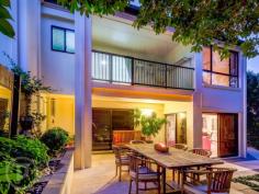 4/22 Macgregor St Wilston QLD 4051 EXTRA LARGE, PRIVATE AND STYLISH TOWNHOME Auction In rooms, Thursday June 4th @ 6:30pm, Place HQ, 33 Lytton Rd, East Brisbane. Conveniently located in prestigious Wilston, and just one of six townhomes in a secure gated enclave, this quality home is generous in size and exhibits subtle architectural flourishes that enhance the spacious layout. Popular Wilston Village, with a choice of cafes and restaurants is within walking distance, as are Home Zone and Reading shopping centres. Situated just 3km from the city it also enjoys close proximity to parklands, bikeways, RBH, the ICB, major arterial roads and the airport tunnel. Bus and train transport is a just a few minutes walk from home.  The sparkling kitchen displays a timeless design and includes a pony wall that allows interaction with family and guests in the step-down, open plan living and dining area. Glistening Caesarstone benchtops, stainless steel appliances and glass splashback ensure optimum functionality as well as style. Two Queen size bedrooms with built-in robes are located on the upper floor including a family bathroom and king-sized master suite featuring ensuite and Walk In Robe with sliding glass doors leading out to a private balcony amid the treetops.  Professionally designed and landscaped, the exquisite private garden and patio is accessed from the living area and provides a tranquil oasis for entertaining, alfresco dining or just a place to exhale and relax at the end of the day.  Additional features comprise a powder room on the lower level, air-conditioning and security screens throughout, abundant storage, a vast remote double garage opening onto the courtyard, visitor parking and electronic gated entry to the pet friendly complex. With a total of 265 square metres of living space, a townhome of this size is rare. Welcome home to your new Place *This property is being sold by auction and therefore a price guide cannot be provided. The website may have filtered the property into a price bracket for website functionality purposes.   Property Details 	 Price  AUCTION IN ROOMS 	 Auction   Thursday, 4 Jun 2015 6:30pm 	 Total Area   265 m2 