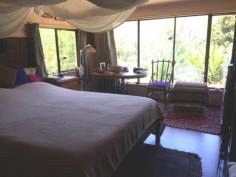  298 Huonbrook Rd Huonbrook NSW 2482 $419,000 Surrounded by lush rainforest and organic fruit trees, this house built with such care and pride has come on to the market for the first time. Part of a Council Approved M.O, this easily accessible 7.5 acres is part of a larger 98 acres with 8 other land parcels.  Features include:  2 Bedrooms  2 Bathrooms  Artists studio  Covered verandas  Above ground pool  Lush gardens For inspections, please call Dave Bosselmann on 0431 100 097 or Russell Siwicki on 0419 627 109. Features General Features Property Type: House Bedrooms: 2 Bathrooms: 2 Land Size: 3.04ha (7.50 acres) (approx) Indoor Toilets: 2 Study Floorboards Broadband Internet Available Open Fireplace Outdoor Balcony Deck Outdoor Entertaining Area Eco-friendly Solar Panels Solar Hot Water Water Tank 