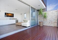  31 Wyndora Ave Freshwater NSW 2096 $2,600,000+ A Freshwater family residence like no other. Architecturally designed from the ground up, this solid double brick three level family home boasts extensive entertaining, low maintenance and is positioned in a premiere location. * Four bedrooms, all with built-ins, on the same level * Master bedroom with dual robes, and ensuite * Heated flooring throughout, reverse ducted a/c, dumb waiter * Two living rooms, wet bar area, two entertaining decks and all offering water and district views * Security alarmed, remote driveway gates, two outdoor showers * Established gardens, external irrigation systems, commercial refridgeration * Wine cellar and designer suspended swimming pool with gas heating * Four car garage, with mezzanine storage and wash up basin Ocean view to the north east, Manly and surrounding district views to the south, high ceilings with louvred windows for natural light and soothing coastal breezes. A sought after location being just a walk to either Curl Curl or Freshwater beaches, Freshwater Village, the CBD express transport, Jacka Park and primary schools.  Land Size: 405 sqm Bidding Guide from Mid to high $2m's Size 405m² approx. 