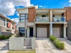  3/58 Lothian St Annerley QLD 4103 Offers Over $529,000 Contemporary Townhouse in a Central Location Enjoying contemporary, low maintenance living this near new townhouse epitomises easy-care convenience within ever popular Annerley. Upon entering this home, be greeted with an intelligently designed floorplan with an open plan living and dining area that seamlessly connects to the modern and well-appointed kitchen. If you have an appreciation for the finer details, you'll love the elegant simplicity of clean, streamlined finishes, polished floors, quality appliances, natural lighting and functional space throughout the home. Notable features include: - Open plan living and dining area with projector screen  - Stylish, air conditioned kitchen with stainless steel appliances and marble bench tops - Three spacious bedrooms, all with built-in wardrobes - Master bedroom featuring walk-in robe, ensuite with marble benchtops and a private, covered balcony - Beautiful main bathroom with bathtub - Separate, internal laundry plus powder room on the ground floor - Gated front entrance plus single remote access garage - 12 panel solar system installed with a three kilowatt inverter  - 2000Lt rainwater tank This immaculate two-level townhouse is located within arm's length of all the essentials; grocery stores, public transport, 24 hour gym, parks, major hospital and easy access to main roads, the highway and just 5km from the city. Don't miss out! Contact Therese Carmichael for more information or to arrange an inspection. This property is being sold by auction or without a price and therefore a price guide can not be provided. The website may have filtered the property into a price bracket for website functionality purposes. This statement is prescribed under Section 10 of the Property Occupations Regulation 2014.   Property Details 	 Price  Offers Over $529,000 