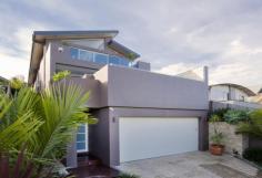  31 Wyndora Ave Freshwater NSW 2096 $2,600,000+ A Freshwater family residence like no other. Architecturally designed from the ground up, this solid double brick three level family home boasts extensive entertaining, low maintenance and is positioned in a premiere location. * Four bedrooms, all with built-ins, on the same level * Master bedroom with dual robes, and ensuite * Heated flooring throughout, reverse ducted a/c, dumb waiter * Two living rooms, wet bar area, two entertaining decks and all offering water and district views * Security alarmed, remote driveway gates, two outdoor showers * Established gardens, external irrigation systems, commercial refridgeration * Wine cellar and designer suspended swimming pool with gas heating * Four car garage, with mezzanine storage and wash up basin Ocean view to the north east, Manly and surrounding district views to the south, high ceilings with louvred windows for natural light and soothing coastal breezes. A sought after location being just a walk to either Curl Curl or Freshwater beaches, Freshwater Village, the CBD express transport, Jacka Park and primary schools.  Land Size: 405 sqm Bidding Guide from Mid to high $2m's Size 405m² approx. 