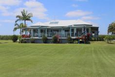  797 Yamba Rd Palmers Island NSW 2463 “Riverview” A Sense of Place, River and Awe Swing off the highway a little north of Grafton, and head towards the coastal village of Yamba. You will find this special home on the river a 10 minute drive from Yamba’s famous beaches. Tucked away off a private laneway, the home has been designed to take full advantage of the river vistas, providing the owners with the ultimate idyllic lifestyle.  The current owners are reluctant to leave the home they have created, which has served them and their family well, improving their lifestyle.  Constructed in 2000, the spacious design incorporates elements such as 11 foot ceilings and covered decks off all the living areas and bedrooms. The open plan living area is north facing, capturing the views from large sliding glass doors beyond the deck and swimming pool, over the immaculately groomed gardens to the river. A major contribution to the lifestyle factor of this home is the impressive kitchen. With solid central island workstation, large wine rack, airconditioning, gas stove, electric oven, dishwasher, double sink and range hood, all stainless steel, oak cabinetry, and practical saucepan drawers. This area extends to the dining room, which overlooks the pool and river. The addition of the leadlight ceiling feature, is reflective of the mood of the river surrounding this property.  The living areas in this home flow seamlessly out onto the covered front deck, the perfect spot to relax with friends and family on hot summer afternoons, and enjoy a BBQ or a pool party while taking in the calming views of the mighty Clarence River.  The master bedroom provides spacious walk in robe, and large ensuite bathroom with corner spa, vanity shower and loo. Two of the remaining three bedrooms, have built-in robes, and the largest fourth room would serve as a bedroom or recreational room for the family. The home is complete with double lock up remote control garage. Not only does this property provide a stylish home with all the modern comforts, there is an established clothing and embroidery business in the 9 x 6m airconditioned shed, serviced by its own shower, loo and office. An opportunity exists for the astute purchaser to utilise this approved facility to have the convenience of working from home. All equipment for the existing business is available for negotiation and the opportunity exists to build on this existing business. The current owners have stated that due to ill health they have not been able to take this business to its full potential.  There is so much more to this property, it simply must be inspected to be appreciated. A unique opportunity to purchase a beautiful home on the Clarence River, an income, an entire lifestyle all in one, this property has it all.  Contact the exclusive marketing agents, Yamba Iluka Real Estate on 6646 2400 to arrange your private viewing today. Property: 	 House Bedrooms: 	 4 Bathrooms: 	 3 Parking: 	 2 Land Size: 	 20680 Sqm Pool: 	 Yes Council: 	 Clarence Valley 