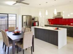  6 Sandridge Way Smithfield Qld 4878 OFFERS OVER $510,000 HIA Award Winning Home 2014 - ULTRA CHIC LIVING Your jaw will drop as you enter this ultra-modern 18 month young property... It definitely has the WOW Factor. So much that this actual home won HOME OF THE YEAR in 2014. Ultra spacious open plan living at its finest with beautiful tiling, high ceilings and feature glass sliding doors to the entertainment area. Designed with indoor outdoor living in mind you will spend endless nights entertaining with family and friends whilst chatting around the built in outdoor barbequing area. * 4 bedrooms main with ensuite and split system air conditioning throughout. * 2 showcase bathrooms * Positioned on a low maintenance block with garden shed and concreted area. * Great kitchen with Caesar stone bench tops * Built in fabulous BBQ area * Smart estate with National Broad Band throughout   Property Snapshot  Property Type: House Construction: RENDERED BLOCK Features: 2 Bathrooms 2 Living Areas 4 Bedrooms Airconditioned Built In Wardrobes Ceiling Fans Close to Park Close to Schools Close to Shops Close to Transport Double Lock up Garage Ensuite Entertaining area Gas Cooking Large Entertaining area Lots of Storage Separate Toilet 