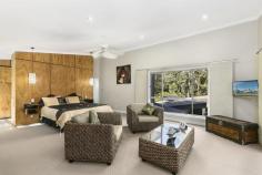  30 Mary Bale Dr Tallebudgera QLD 4228 Offers over $1,299,000 Thoughtfully designed and flawlessly appointed this home offers the rare combination of an opulent acreage lifestyle with the convenience of being ideally located 10 minutes to the pristine beaches of Burleigh Heads.  The residence presents on a private 5663m2 block with immaculate established gardens and superior security system installed to set your mind at ease.  - 5 bedrooms plus office, 3.5 bathrooms, 4 car garage. - Large formal lounge with formal dining and additional rumpus and music room. - Executive master suite with WIR and ensuite. - Gourmet chef's kitchen with stone bench top and gas cook-top. - Flowing open plan living and dining off kitchen opening to outdoors. - Wonderful spa, gymnasium and workshop. - Outdoor entertaining fit for large numbers, huge undercover timber decks. - Sparkling in-ground pool with flowing waterfall.  - Voice intercom, alarm system including CCTV cameras.  - Crimsafe security screens, solar power electricity. - The main & ensuite bathrooms include floor heating. - Air-conditioning and fans throughout. - Vacuum maid integrated in the residence. - Secure garaging for up to 4 vehicles. - An inspection is a must!! Set amongst a picturesque setting and home to koalas, kangaroos, kookaburras and only minutes to schools, shops, sporting grounds, golf courses, major shopping and not even 10 minutes to the golden sands of Burleigh Heads Beach. This is truly a sanctuary to escape to and enjoy every day, whether you have a large family, looking to run a home business or just searching for a bush land hideaway the potential in this stunning Tallebudgera Springs estate is infinite.  Print Brochure Video Virtual Tour Email Alerts Features  Land Size Approx. - 5663 m2 