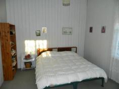  54 Railway St Helidon QLD 4344 $224,500 WALK TO THE SHOPS AND SCHOOL Great location is just one of the features of this 3 bedroom family home on a large fully-fenced block in peaceful Helidon. Enjoy the benefits of solar power, solar hot water, tank and town water and reverse cycle A/C.  Call for an inspection TODAY, this value can't last. FEATURES Bedrooms 3 Bathroom 1 Storage 6x3 Garden Shed (approx) Size 1176m2 (approx) Location Walking distance to school, shops and bus Cooling/heating 2 x Reverse Cycle A/C Parking Carport Other Solar Panels Solar hot water 2 x tanks Fully fenced Contact Scott Collier on 0423 539 872   Property Snapshot  Property Type: House Construction: Cladding Zoning: RESIDENTIAL - LOW DENSITY Land Area: 1,176 m2 Features: Dining Room Fenced Back Yard Fully Fenced Yard Garden Shed Undercover Entertainment Area Verandah 