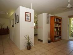  34 Thomas Ct Bulgun QLD 4854 $450,000 SPACIOUS LIVING ON LARGE BLOCK BORDERING CREEK This well presented 3 bedroom home has a lot to offer in the way of serene surroundings as well as proximity to the centre of Tully, approximately 10 minutes drive. The block is approx. 8002m2 in size. Tiled throughout and with verandahs around three sides for shade from Easterly and Westerly sun, this home has a coolness even on warm days.  The sleek, modern kitchen accomodates barstools and is a great size for those who love to cook and entertain. A viewing window through to the living room ties both spaces together and makes sure that light as well as conversation flow through to the living space. Views from the dining table are that of beautiful green rainforest foliage and distant mountain ranges. Adjacent to the kitchen, the large office space has access to the back patio.  3 bedrooms all feature built-ins with mirrored sliding doors. A vast amount of storage is offered in this home with floor-to-ceiling cupboards running the length of the hall. The bathroom offers a shower and single vanity with separate toilet adjacent. The laundry is a great feature being so large in size and boasting an internal clothesline for those grey Tully days.  The double bay remote operated roller door garage is a great asset to the property featuring a small kitchenette and a drive through roller door to the backyard as well as the ability to park 4 cars comfortably. The driveway has ample facilities for off-street parking and is well maintained, just like the gardens . The back patio has a bench and sink configuation which is currently being used for gardening purposes, but could easily serve as part of an outdoor kitchen if needed. The back yard also features a good size garden shed for all your gardening and hobby storage solutions. This house has a lot to offer and is definitely worth a look. For any enquiries do not hesitate contacting one of our friendly sales team at LJ Hooker Tully (07) 4068 1100   Property Snapshot  Property Type: House Construction: Concrete Block Zoning: RESIDENTIAL (RURAL) Land Area: 8,002 m2 Features: Built-In-Robes Established Gardens Garden Shed Outdoor Living Remote Control Garaging Renovated Security Screens Storage Undercover Entertainment Area Verandah 