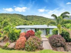  20 Palmetto St Palm Cove QLD 4879 Offers mid $500,000's BELOW REPLACEMENT COST If you do your sums it will cost you much more than the asking price to build this home with the optional extras that were included in this home when built. - Large and spacious with 2 living areas - Master bedroom with walk-in robe and ensuite bathroom - Fully airconditoned throughout and quality window dressings - Undercover patio with direct access to inground pool - Remote double garage with extra room for storage - Fully landscaped corner block - Home is insulated with gas heating and cooking Island View Estate is a prestigious place to live in popular Palm Cove as original building covenants maintained a high level of quality homes. Land locked by the mountains & the sea, values will be kept at a premium in this area . This home is currently tenanted at $550pw until Feb 2016. For inspection Contact Susan Cooper to arrange a viewing with 24 hours notice.   Property Snapshot  Property Type: House Construction: Rendered Block Zoning: Residential 2 (2060) House Size: 300.00 m2 Land Area: 735 m2 Features: Built-In-Robes Close to schools Close to Transport Coastal Ensuite Established Gardens In-Ground Pool Outdoor Living Remote Control Garaging Security Screens Undercover Entertainment Area Walk-In-Robes 