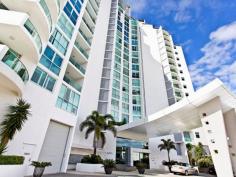  1205/300 Marine Parade Labrador Qld 4215 Panoramic Broadwater Views and South to the Skyline of Surfers Paradise Golden Mile this Marine Parade residence is located in the exclusive Aqua Apartments Situated on the 12th floor the apartment has unsurpassed views from the Broadwater to the Pacific Ocean. Now combine this with immediate access to the fabulous alfresco dining precincts on the Boardwalk from Charis Seafoods to Southport . Just a short stroll to beautiful parks and only minutes away from all the major facilities that the Gold Coast has to offer; - Australia Fair Shopping Centre - Harbour Town DFO - Gold Coast University Hospital - Griffith University - CBD Southport only minutes with new light rail - Labrador Beach and close to Surfers - Gold Coast Aquatic Centre Aqua has everything and more to offer from a residential building of high standard with quality finishes throughout for owner occupier to enjoy and or the investor looking for long term capital gains. Gold Coast is hosting the 2018 Commonwealth Games and prices are steadily increasing annually. 2 SPACIOUS BEDROOMS 2 BATHROOMS 1 STUDY/ 3RD BEDROOM VOGUE KITCHEN LARGE SPACIOUS LIVING AREA EAST FACING BALCONY MOVIE THEATRE 25 METER POOL  TENNIS COURT  GYM  SAUNA  SPA  RESIDENTS' LOUNGE Call Julie Nugent for more information or come to our advertised Open Homes Disclaimer: We have in preparing this information used our best endeavours to ensure that the information contained herein is true and accurate, but accept no responsibility and disclaim all liability in respect of any errors, omissions, inaccuracies or misstatements that may occur. Prospective purchasers should make their own enquiries to verify the information contained herein.  * denotes approximate measurements 