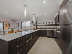  35 Sandover Circuit Holmview Qld 4207 Price by Negotiation over $375,000 Property Information Don't go through the hassles and stress of building when everything has already been done for you! Empty nesters downsizing? Single or professional couple? Young family? No time for gardening and want a maintenance free outdoors? Tick. Tick. Tick. Tick. This modern, lowset, brick and tile home seriously ticks all the boxes with superior quality finishes and larger rooms and areas than the standard turnkey package. Owners have decided to relocate south, so are putting their prized Hallmark home on the market. Property features: - 	 Huge, carpeted master bedroom with large ensuite and walk-in robe - 	 2 other good sized, carpeted bedrooms - 	 Large, tiled open plan living and dining area - 	 Stunning, designer kitchen with stainless steel appliances; large stone benchtops; and loads of cupboard space for the most discerning cook - 	 Generous main bathroom with a floor to ceiling linen cupboard - 	 Large laundry with plenty of cupboard space for storage - Split system airconditioning throughout - 	 Intimate, covered alfresco area - 	 Decorative pebbled backyard and surrounds for low maintenance - 	 Fully fenced with security screens and doors throughout - 	 Solar panels - 153m2 approx building size This property is located in the fast growing, family oriented Vale Estate with convenient proximity to the Pacific and Logan Motorways; public and private schools; Logan Hospital; train and bus interchanges; and shopping centres. Make an appointment to see that there has been no exaggeration! Floor Area 	 153 sqm Property condition 	 New Property Type 	 House House style 	 Lowset Garaging / carparking 	 Single lock-up Construction 	 Brick veneer Roof 	 Tile Flooring 	 Carpet and Tiles Window coverings 	 Blinds Heating / Cooling 	 Solar, Split cycle a/c Electrical 	 TV points Property features 	 Safety switch, Smoke alarms Kitchen 	 Designer, Dishwasher, Separate cooktop, Separate oven and Rangehood Living area 	 Open plan Main bedroom 	 Walk-in-robe and Heating / air conditioning Ensuite 	 Separate shower Bedroom 2 	 Built-in / wardrobe and Heating / air conditioning Bedroom 3 	 Single Main bathroom 	 Separate shower Laundry 	 Separate Outdoor living 	 Entertainment area (Covered and Paved) Fencing 	 Fully fenced Land contour 	 Flat Grounds 	 Manicured Water supply 	 Town supply Sewerage 	 Mains Locality 	 Close to shops, Close to schools, Close to transport 