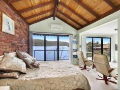  10 Milloo Parade Mooney Mooney NSW 2083 Live a Holiday Lifestyle Everyday, Just 30 Minutes from the North Shore. Presenting a truly unique offering, that is seldom available in this tightly held river front enclave. This immaculately presented waterfront property is desirably positioned in Cheero Point directly overlooking the river with views across to the picturesque mountains of the Brisbane Water National Park. Peace & privacy can be yours in this contemporary, split level home that comprises of 4 bedrooms and a stylish main bathroom. The stunning main bedroom suite is complete with its own media room and bathroom. The open plan living and dining areas perfectly capture the river vista and flow effortlessly outdoors to the entertainment deck. The property is easily accessable, offers double garaging plus storage, and even a place to tie up your boat. Council rates (approx) $ 2,411 per year. Inspection By Appointment.  Please call Andrew Macdonald M# 0415 433 957 