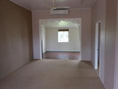  78 Daintree St Clermont QLD 4721 $310,000 NEG PRICED TO SELL!! BIG ON ROOM - SMALL ON PRICE! Nestled on a 607m² freehold block in the heart of town, this home ticks all the boxes! Featuring: - 3 carpeted bedrooms (built-ins to the main)  - Beautifully renovated kitchen with walk-in pantry, loads of cupboards and bench space, polished timber flooring, stainless cooktop, oven, rangehood and dishwasher - Massive open plan lounge/dining area - Classy renovated bathroom with tiled floor, bathtub, shower, vanity, linen cupboard and cubed glass feature window - Split system air-conditioning and ceiling fans throughout - Front timber deck - Downstairs is fully concreted with a separate air-conditioned room which could be used as a 4th bedroom or office, renovated laundry and 2nd shower and toilet, underhouse parking for 2 vehicles, and plenty of storage space  - Fully fenced back yard COME AND INSPECT TODAY - CALL LJ HOOKER CLERMONT ON 07) 49831 011   Property Snapshot  Property Type: House Construction: Weatherboard Land Area: 607 m2 Features: Balcony Built-In-Robes Close to schools Dining Room Dishwasher Fenced Back Yard Lounge Polished Timber Floors Renovated Security Screens Storage 