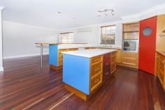  12 Bhowani Pl Kuraby QLD 4112 $799,000 Price Reduced for Immediate Sale* Open Saturday from 11am to 11:30am Situated in the popular suburb of Kuraby, perched high above the clouds rests this 3 storey castle in Kuraby. As it is one of the most unique houses I have ever had the pleasure of walking through in 8 years of selling houses in Kuraby, I am humbled to present this magnificent property to you. Situated on 715m2 of real estate gold, this double brick home is unique in almost every aspect. From its hardwood timber floors to its large and opulent living areas, what we are selling here today is definitely the lifestyle. The wrap around balcony gives you the most amazing views from your front door and the 30 metre bore hole gives you and your household an unlimited supply of fresh natural water without having to pay for it. The yard will be the first thing that catches your eye. Large, lush and spacious . You can almost envision yourself working the BBQ, the sizzling sound of that rib eye fillet you have been eyeing at the local butcher, the sound of your children kicking around the footy.  Upstairs boasts 4 large bedrooms. All with their own built in robes and 3 large bathrooms.  Because you are positioned so high up, the breezes come to you, so if you want to be that "one in a million" family that has the most well built and well designed house in your suburb, then come and visit us at the Open house this Saturday  Featuring: 4 Large bedrooms plus 2 x studies 3 Bathrooms (including ensuite) 2 Car Garage First Level: Double Remote Garage Study Room Large Workshop Area Second Level Formal Living Area with Fireplace Study Laundry (connected with a laundry chute from the 3rd level) Open Plan Kitchen Family Area Rumpus Room (big enough for a pool table) Games Room Outdoor Patio area Bathroom Third Level 4 Bedrooms 2 Bathrooms (including Ensuite) Family Living Area Unique Features of the house Own Water Supply with 30metre bore hole Spotted Gum timber floors throughout Fire Place with Sandstone Floor Built in BBQ Ethernet Cabled throughout Electronic Watering System Solar Hot Water System A copy of the building and pest inspection is available on request Features Property ID 12841833 Land Size 715 Square Mtr approx. Building Size 406 Square Mtr approx. Air Conditioning Built In Robes Courtyard Dishwasher Floorboards Fully Fenced Outdoor Ent Remote Garage Rumpus Room Split System Study Workshop 