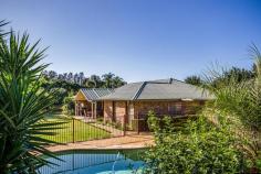  28A Lerra Rd Windella NSW 2320 Offers over $695,000 Set privately amid beautifully established gardens, this generously scaled home provides effortless family living. Its secluded position belies its central location, which is a short drive to Rutherford and Maitland shopping precincts and only 35min to Newcastle via new link road. Situated on a tree studded, 5400m2 block at Windella, this stunning architect designed home is impressive, spacious, cleverly designed, built to the highest quality and attention to detail. A formal entry leads to the sunken formal lounge on one side and the living room on the other which extends to a dining area opposite.  Central to these is the impressive kitchen, with deep walk in pantry, dishwasher, stunning granite bench top, and island bench with new stainless steel cooking appliances. Quality features include ironbark hardwood floors, high ceilings, air- conditioning and wood fires. All bedrooms have built in robes, fans, 2 rooms with French doors to surrounding veranda’s, the master bedroom has large walk in robe. Abundant internal storage space. The rear garden has an opulent pool area, covered entertaining areas, large cubby house and double garage. This property is surrounded by established and low maintenance grounds and gardens which have full reticulation. The added bonus is the 30 metre train carriage (complete with 3 Phase power and water connection) situated in the rear of the block; presently used for quest accommodation and art studio, this has endless possibilities. Features Elegant formal lounge and dining areas Tranquil alfresco entertaining areas and wide verandas Established lawns and enticing pool areas Gourmet kitchen with quality appliances and walk in pantry Guest quarters has queen size bedrooms and private bathroom Parents wing is appointed with walk-in in robe and 2 way bathroom with spa Air-conditioning, cosy fireplaces and high ceilings Conveniently located near schools and only short drive to Maitland shopping precincts Bonus Train Carriage Presently used for quest accommodation and art studio 