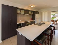  41 Saltwater Cres Corindi Beach NSW 2456 $450,000 Reduced AFFORDABLE BEACHSIDE LIVING This immaculate 5 year old home has been reduced and is now representing fantastic value for money. Designed with a great family friendly layout in mind. The open plan living incorporates the sleek comtemporary kitchen with ceramic cooktop and dishwasher and combined dining and generous living area, equip with Reverse Cycle Air Conditioning. There is a generous media room/ lounge room that can be separated by sliding doors. This home has a classic cool feel with modern tiles and vertical blinds throughout. The main bedroom is very generous in size with an elegant ensuite and huge walk in robe, through glass sliding door you can access the alfresco area. The 3 additional bedrooms are all larger than the average all with built-ins. Undercover alfresco area, that overlooks the large backyard were you can let your imagination run wild with this blank canvas. Large 747m2 block. Under 500m to Corindi Beach Corindi has grown in recent years & has a Caravan Park, Chemist, Cafe, Post office, Skate park, Convenience store & Tavern. Property: 	 House Bedrooms: 	 4 Bathrooms: 	 2 Parking: 	 2 Land Size: 	 747.3 Sqm Local Amenities: 	 Schools Shops Sports Field & Club Park Council: 	 Coffs Harbour 