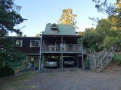  42 Elizabeth St Imbil QLD 4570 $375,000 Hidden Retreat House - Property ID: 785268 This gorgeous hidden cottage is set back from the road and located in a very private and quiet cul-de-sac in the beautiful town of Imbil. Situated on a very large 1.08ha 2 acres and totally private from the outside world.  If you are looking at that perfect rural tree change but still need to be within 20 minutes to a major town, than look no further. Within only 20 minutes to Gympie, walking distance to the local shopping precinct and only 45 minutes to the glorious Noosa Main Beach this well maintained 2 story cottage simply awaits it's new owner. This high-set timber home offers 3 bedrooms, two bathrooms, 2 main living areas and a central kitchen with polished timber floors and a large balcony to capture the glorious views and cool breezes. Located within a fabulous community with lovely neighbors, it is with great hesitancy that this loving owner must relocate. This massive 10,800m2 parcel of land offers space for vegie gardens, a pool, running space and nature at is best. Under the house offers ample car space with sealed bitumen and plenty of room to build in a teenager retreat or games room, and don't forget the double steel frame shed for all the toys. This property is also on town water and is sewered which is fantastic for this area. To arrange a private inspection today, please call Kristy Simi 0414 409 139 or email kristy.simi@professionals.com.au 