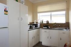  6/18 Broughton Pl Queanbeyan NSW 2620 Price $235,000+ Only 6 units in this complex This sensational 2-bedroom unit will wipe the smile off your landlords face. Packed with value, it's a real mortgage buster. Enjoy benefits that are usually reserved for much more expensive properties, such as a large north facing balcony, quiet location and your own internal laundry. Set at the rear of the complex, it is ideal for renovating.  Sensational 67.5 m2 of living Carport and internal laundry Neatly presented complex Short walk to the city centre Only minutes from Fyshwick, schools and buses Currently tenanted on a month to month lease you can put it straight into your property portfolio or get ready for your spring time house warming party. So don't let this one get away, call now on 6297 9191 at any time. Nobody in the world sells more real estate then RE/MAX. Disclaimer: All parties should rely on their own investigation to validate this information, as we cannot guarantee it. We have diligently and conscientiously undertaken to ensure it is current and accurate, however, we do not accept any liability for an inaccuracy or misstatement. Property Features Property ID 	 11409013 Bedrooms 	 2 Bathrooms 	 1 Carports 	 1 Building Size 	 80 Square Mtr approx. Body Corporate Fees 	 $417.71 Quarterly Rates 	 $1763.78 Yearly Balcony 	 Yes Built In Robes 	 Yes 