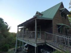  42 Elizabeth St Imbil QLD 4570 $375,000 Hidden Retreat House - Property ID: 785268 This gorgeous hidden cottage is set back from the road and located in a very private and quiet cul-de-sac in the beautiful town of Imbil. Situated on a very large 1.08ha 2 acres and totally private from the outside world.  If you are looking at that perfect rural tree change but still need to be within 20 minutes to a major town, than look no further. Within only 20 minutes to Gympie, walking distance to the local shopping precinct and only 45 minutes to the glorious Noosa Main Beach this well maintained 2 story cottage simply awaits it's new owner. This high-set timber home offers 3 bedrooms, two bathrooms, 2 main living areas and a central kitchen with polished timber floors and a large balcony to capture the glorious views and cool breezes. Located within a fabulous community with lovely neighbors, it is with great hesitancy that this loving owner must relocate. This massive 10,800m2 parcel of land offers space for vegie gardens, a pool, running space and nature at is best. Under the house offers ample car space with sealed bitumen and plenty of room to build in a teenager retreat or games room, and don't forget the double steel frame shed for all the toys. This property is also on town water and is sewered which is fantastic for this area. To arrange a private inspection today, please call Kristy Simi 0414 409 139 or email kristy.simi@professionals.com.au 