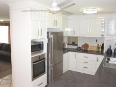  2 Andrew Ct Boyne Island QLD 4680 $470,000 NEG Excellent Home With Room To Park the Caravan. If you love to entertain or enjoy outside living this property is for you. This beautifully presented spacious 3 bedroom home is located on a level 781sqm corner allotment and offers a large undercover entertainment area with a sparkling saltwater in ground pool. The home is surrounded by a low maintenance yard with a large carport ideal for a caravan/boat. Situated only a short stroll to the Boyne River with easy access to all amenities and schools, this property is worth your time and will surprise you. Neutral colour tones decorates this lovely home throughout.  Spacious is not the only feature of this well presented home, it boasts: *Large air-conditioned main bedroom with a resort style ensuite and built-in wardrobe. *Generous size bedrooms is with built-ins and ceiling fans, 1 bedroom is air conditioned. *A surprising large air-conditioned family room with a separate dining room. *Well-appointed kitchen with plenty of storage, bench space and stainless steel appliances. *Living/dining area of the kitchen opens up to a lovely large undercover entertainment area. *A large internal laundry with plenty of cupboard space and access to the outside.  *The main bathroom features a shower bath and separate toilet. *Low maintenance yard with in ground salt water pool with pool equipment & pool cover *Large undercover entertainment area with a carport ideal for a boat or caravan. *Garden shed for storage. This property is ready for new owners to settle in and enjoy a coastal lifestyle. Golf, fishing and magnificent waterways near-by completes the picture. Don't wait call me today on 0408 738 767 to book your inspection.   Property Snapshot  Property Type: House Construction: Brick Veneer Land Area: 781 m2 Features: Built-In-Robes Dining Room Dishwasher Ensuite Established Gardens Family Room Fenced Back Yard Garden Shed In-Ground Pool Lounge Outdoor Living Read more at http://tannumsands.ljhooker.com.au/AKBFKE/2-andrew-court-boyne-island#XdO6UkDBerKOUGJY.99 